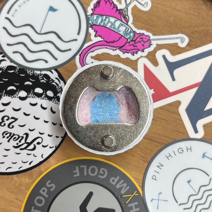 Golfball bottle opener