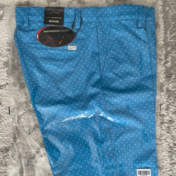 Greg Norman MicroLux Performance Stretch Golf shorts. Blue star print. 34W. Brand new in bag, tags still on.