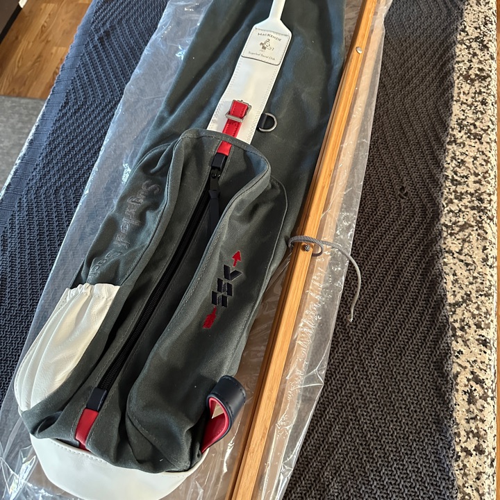 MacKenzie Golf & Sugarloaf Social Club 7” Grey waxed canvas carry bag. Comes with trestle sticks shown.